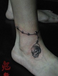 女人脚腕经典的骷髅脚链纹身图片