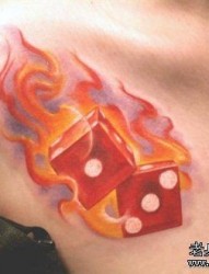 色子火焰纹身图片：胸部色子火焰纹身图片纹身作品