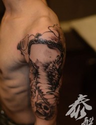 男生胳膊象财神骷髅纹身图片