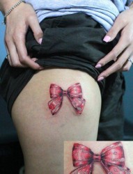 女人大腿处好看流行的蝴蝶结纹身图片