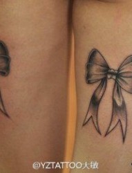 美女腿部时尚清晰的蝴蝶结纹身图片
