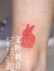 腿部可爱的指纹小兔子纹身图片
