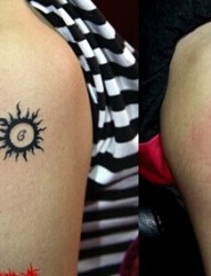 手臂情侣图腾太阳纹身图片