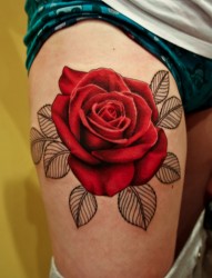 一幅另类大腿漂亮玫瑰纹身