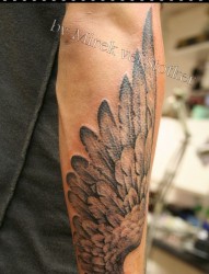 手臂翅膀纹身，重庆纹身店，重庆纹身培训，重庆刺青店