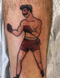 小腿上彩色纹身传统拳击男人纹身图片
