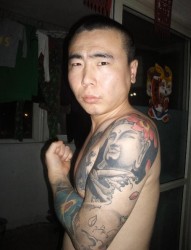 男人手臂艺术如来佛纹身图片