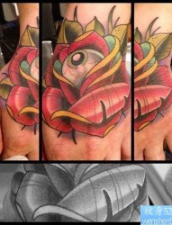 手背上一张欧美玫瑰花纹身图片