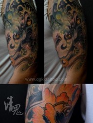 男生手臂前卫超酷的唐狮子纹身图片