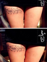 女人大腿前卫流行的花体字母纹身图片