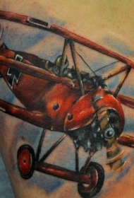 复古风格的彩色飞机手臂纹身图案