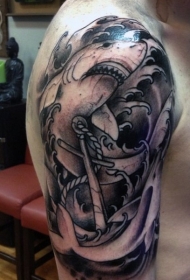 手臂黑色鲨鱼和船锚纹身图案