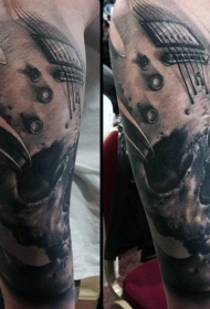 手臂黑色骷髅结合吉他纹身图案
