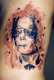 手臂抽象风格的彩色迈克尔杰克逊肖像纹身图案