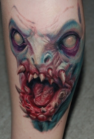 腿部彩色的3D怪物脸血腥纹身图案