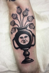 有趣的黑色花瓶和人脸手臂纹身图案