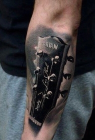 非常棒的写实吉他手臂纹身图案