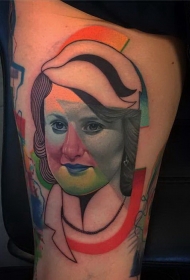 大腿抽象风格的彩色女性肖像纹身图案