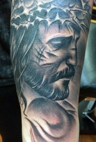 黑色悲伤的耶稣肖像手臂纹身图案