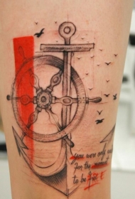腿部船舵与船锚和字母纹身图案
