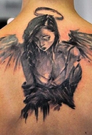 背部黑色的水墨抽象悲伤天使纹身图案