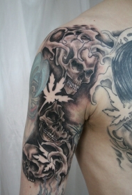 男性手臂笑脸骷髅个性纹身图案