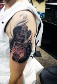 大臂3D写实的黑色吉他纹身图案