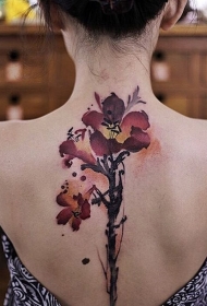 女生背部亚洲风格的抽象彩绘花朵纹身图案