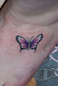 脚踝上粉红小蝴蝶纹身图案