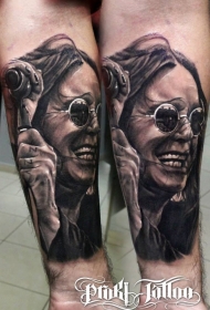 著名音乐家肖像与麦克风手臂纹身图案