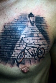 胸部自行车和墙壁灯光纹身图案