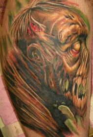 手臂毛骨悚然的彩绘大怪物面部纹身图案