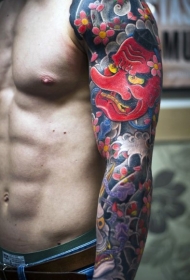 花臂亚洲风格的彩色花朵男子纹身图案