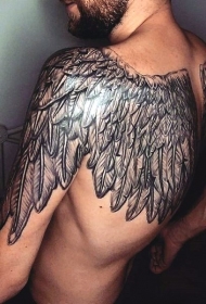 背部华丽的黑白翅膀纹身图案