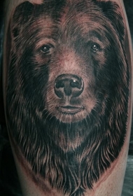一只灰色的熊头像纹身图案