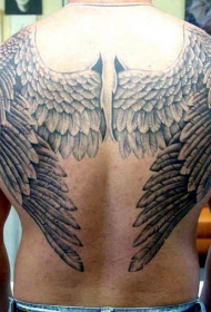 背部经典的黑白翅膀纹身图案