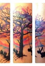 手臂水彩树和秋千小女孩剪影纹身图案