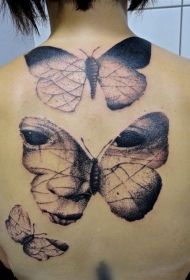 背部点刺风格黑色的蝴蝶和眼睛纹身图案