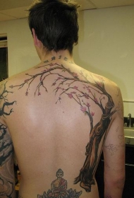 背部佛像莲花座和大树纹身图案