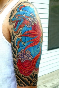 大臂亚洲蓝色唐狮个性纹身图案