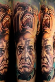 手臂彩色恐怖风格两个男性肖像纹身图案