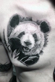 胸部黑色栩栩如生的熊猫头像纹身图案
