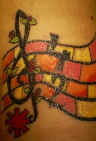 手臂彩色的音符和玫瑰纹身图案