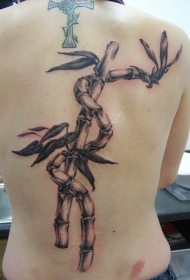 背部黑灰植物竹子与十字架纹身图案