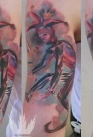 手臂上令人敬畏的水彩小丑纹身图案