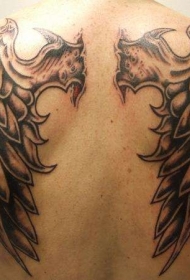背部简单的黑色怪物翅膀纹身图案