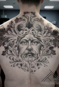 背部黑色的古代男子肖像与树叶纹身图案