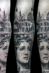 小臂old school黑色妇女雕像与教堂纹身图案