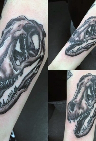 手臂黑色经典恐龙头骨纹身图案