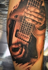 小腿写实音乐家弹吉他纹身图案